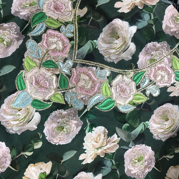 Embroidered Floral Lace on Green Fabric
